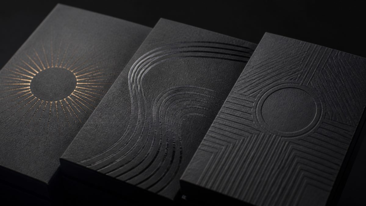 Close view of cigar box lid art with restrained metallic, gloss, and raised finish effects