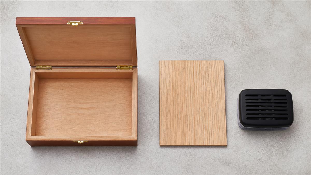 Cigar box with separate unbranded storage components shown as a system