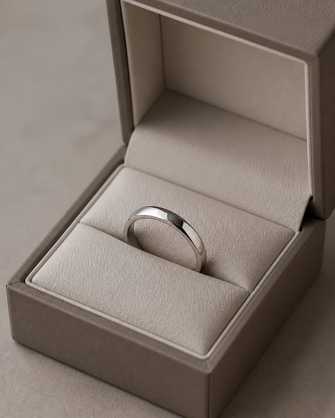 Jewelry box insert holding a pendant and earrings securely in a presentation layout