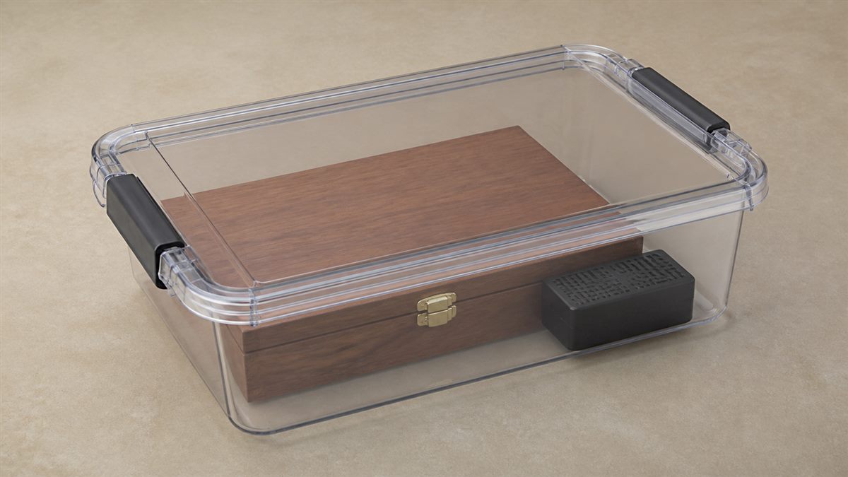 Clean sealed storage container with unbranded humidity-control accessory for temporary cigar storage