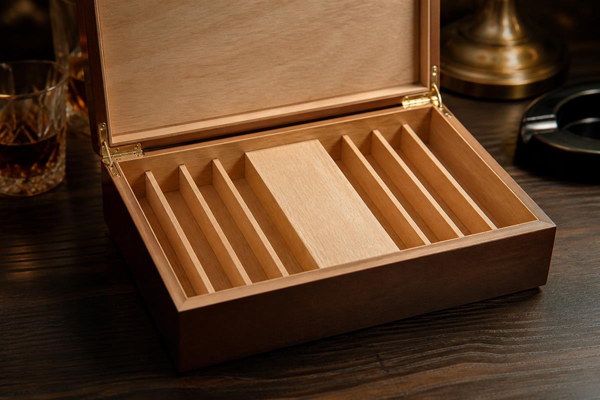 Open unbranded cigar presentation box showing organized interior layout