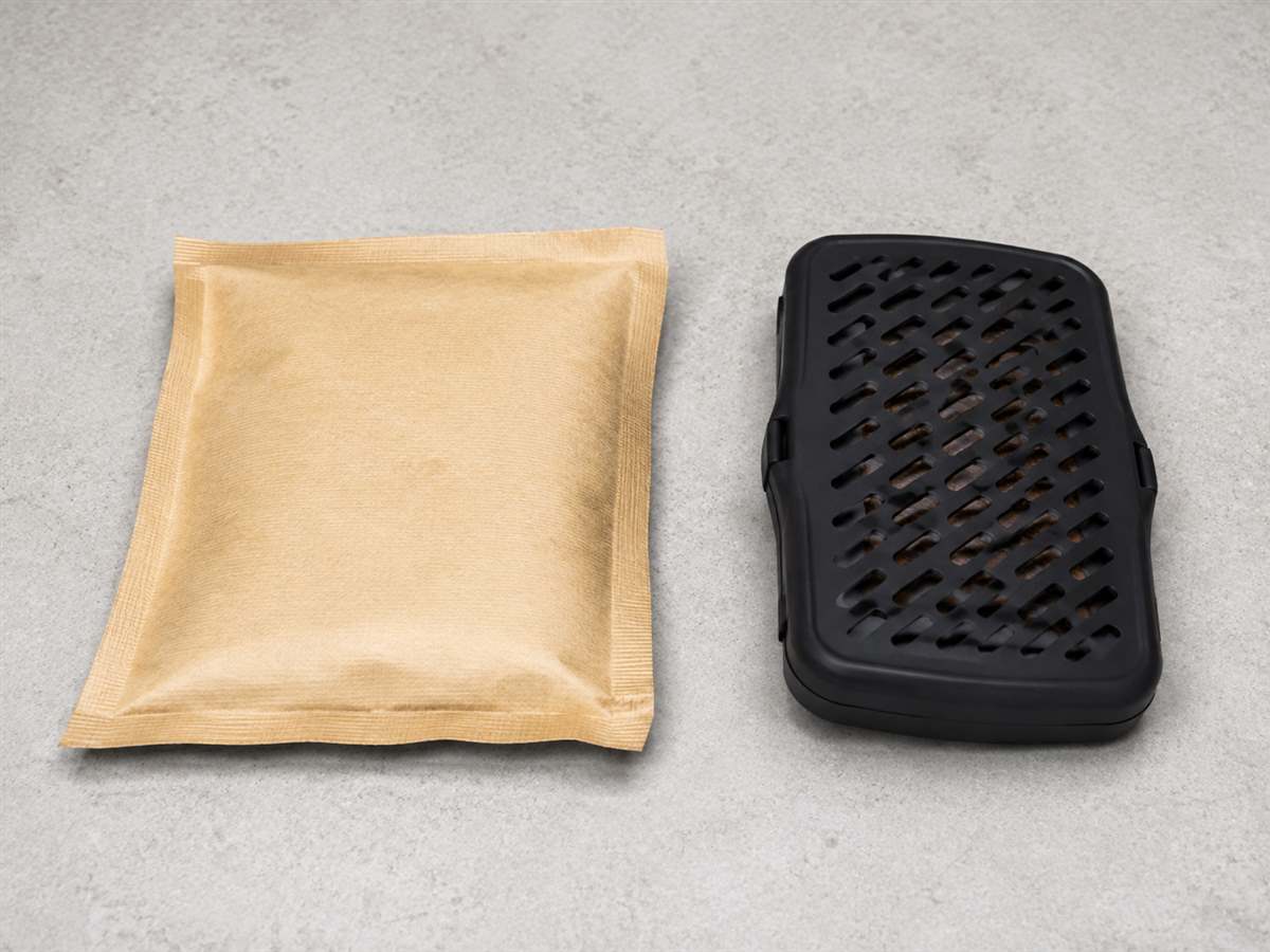 Sealed humidity packet beside a refillable humidifier housing